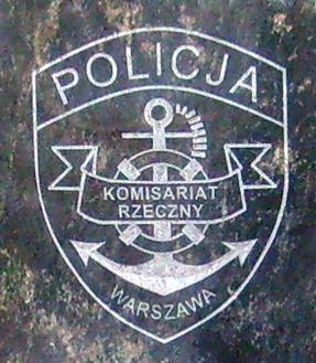 Logo Komisariatu Rzecznego wykute w kamieniu