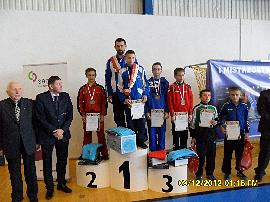 Na najwyższym stopniu podium Daniel Marciniak z trenerem Jackiem Sidorowiczem